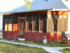Construct screen porch to increase summer usability